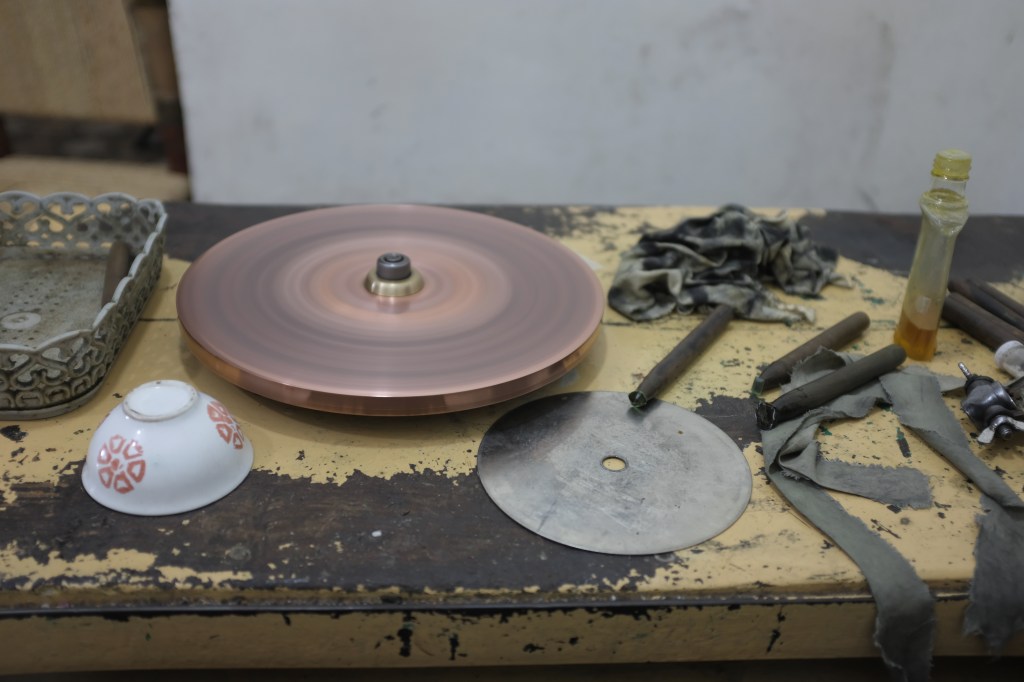 Copper lap used in hand-faceting, Peshawar, Pakistan, 2019
